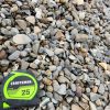 An overhead photo of a pile of rounded river rock gravel, with a mix of colors including gray, brown, and tan. A green and black "CRAFTSMAN 25'" tape measure is in the bottom left corner, providing a sense of scale.